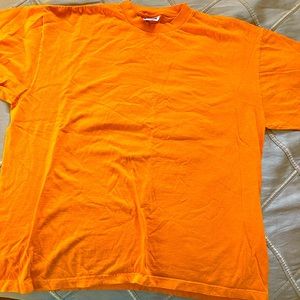 Man’s cotton T-shirt. short sleeves. Nice color orange! Work out or hangout!